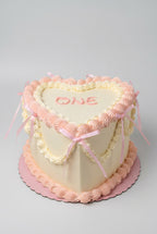 coeur rose avec noeud 